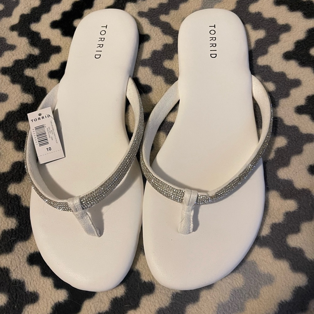 NWT size 10 Torrid flip flops with “bling”